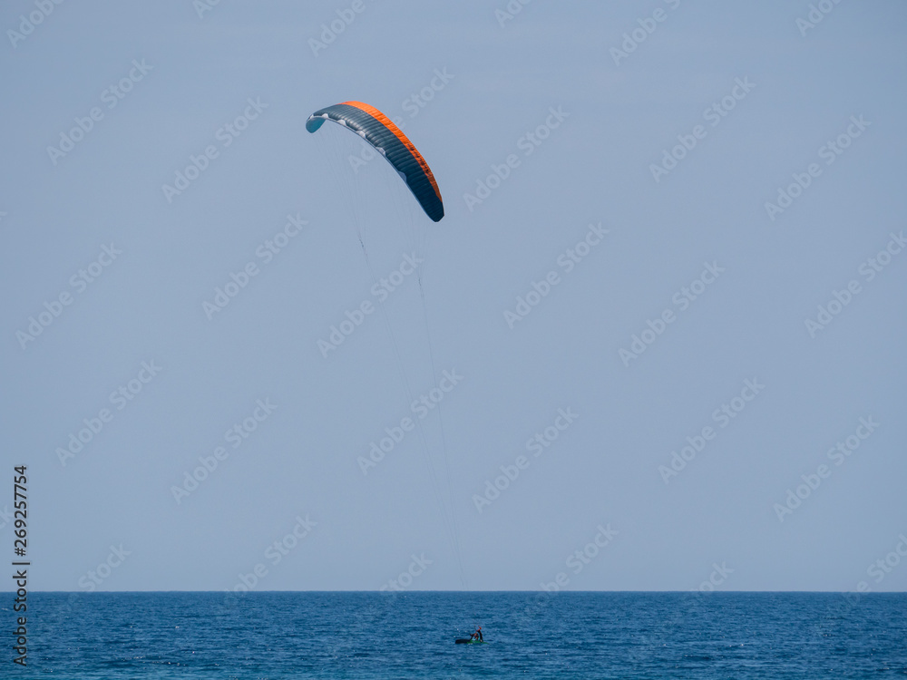 Summer water sports in clear open sea ocean Summer water sports in clear open sea ocean