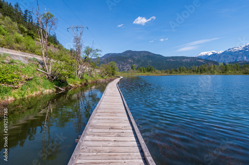 View at Wooden Trail in Park and Lake. Vancouver, Canada. © karamysh