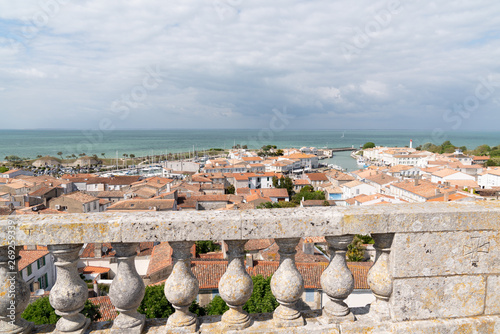 panorama view through railing of church in St Martin de Re in France photo