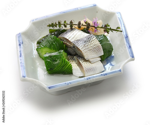Kohada Sunomono( spotted sardine vinegared dish),  japanese cuisine. Sunomono is a kind of Japanese sour salad. It is made of vinegared vegetable or seafood. photo