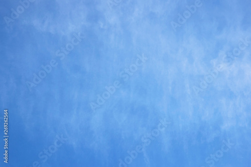 Air clouds in the blue sky. Light Clouds backdrop for text.