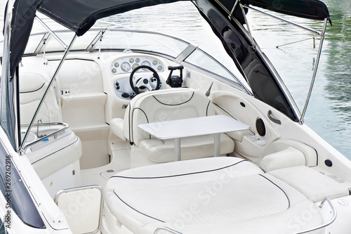 Steering wheel of sea boat in parking © Sergey Ryzhov
