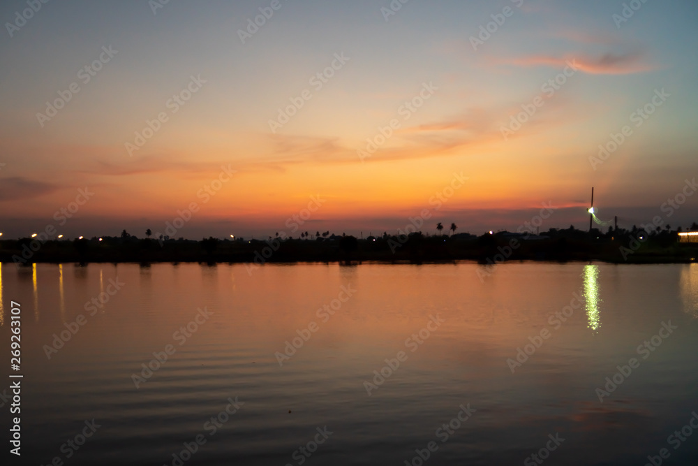 The sky in evening, the sunset over lake background