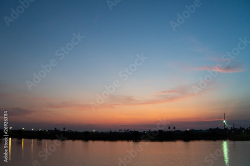 The sky in evening, the sunset over lake background