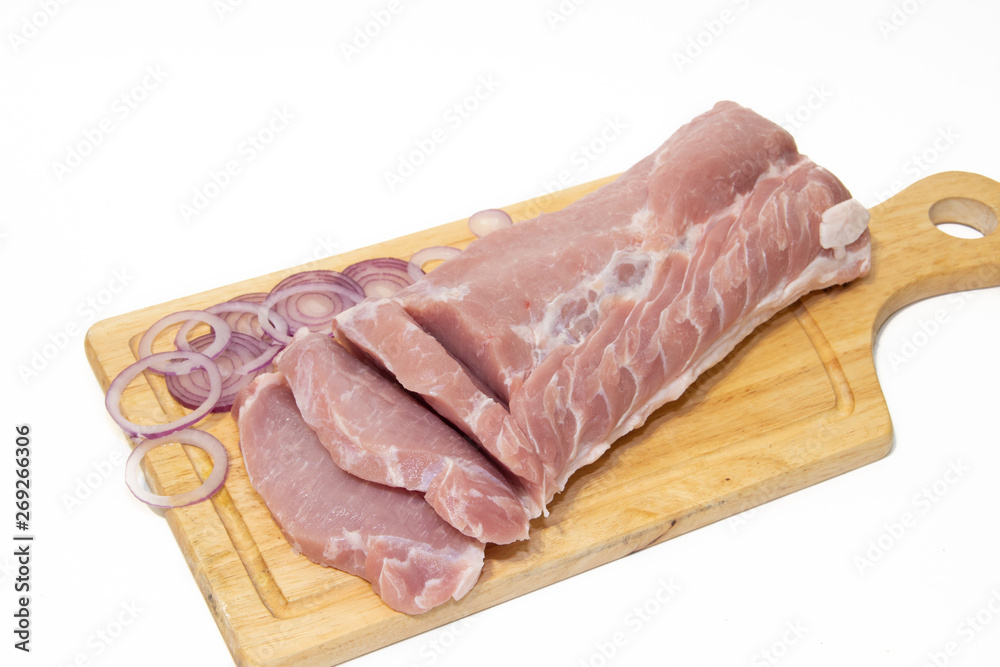 Pork chop isolated on white background. Meat on a white background. Raw meat . Pork chop isolated on white background. Meat on a white background. Raw meat .