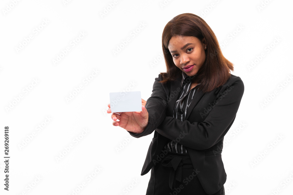 dark-skinned young smilling girl handing a card isolated on white background dark-skinned young smilling girl handing a card isolated on white background