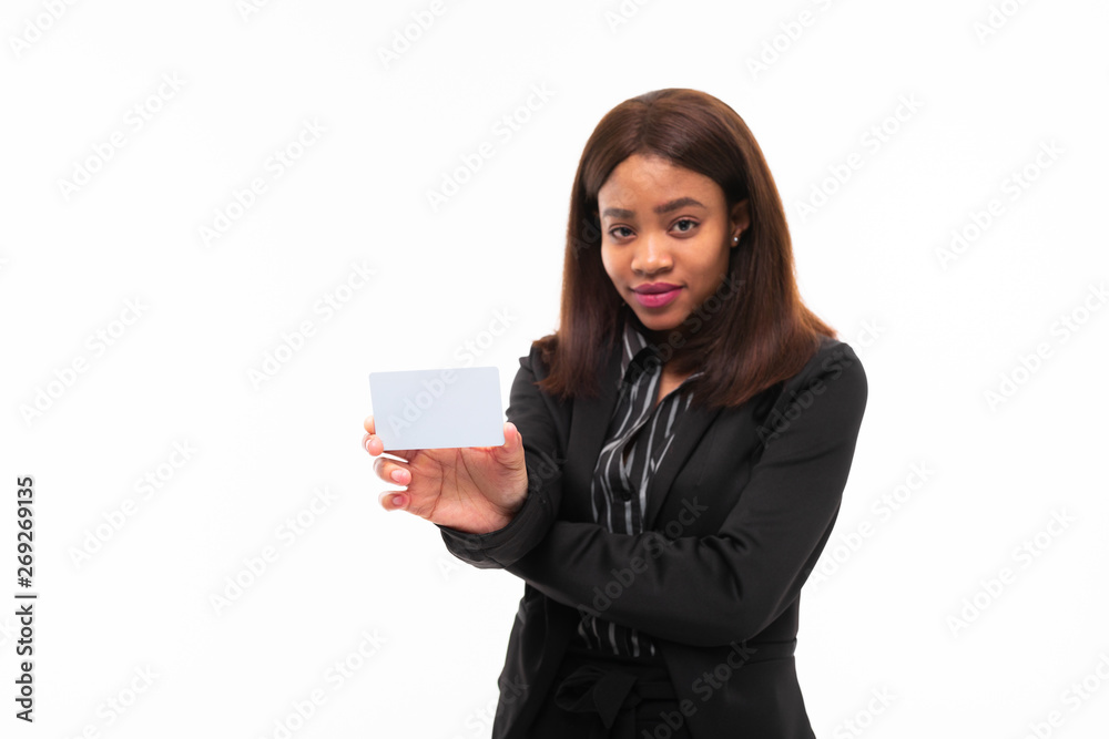 dark-skinned young smilling girl handing a card isolated on white background dark-skinned young smilling girl handing a card isolated on white background