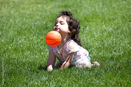 little girl with ball