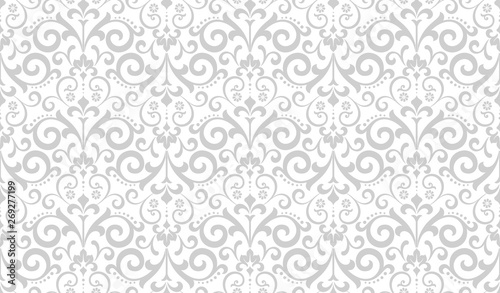 Wallpaper in the style of Baroque. Seamless vector background. White and grey floral ornament. Graphic pattern for fabric, wallpaper, packaging. Ornate Damask flower ornament.