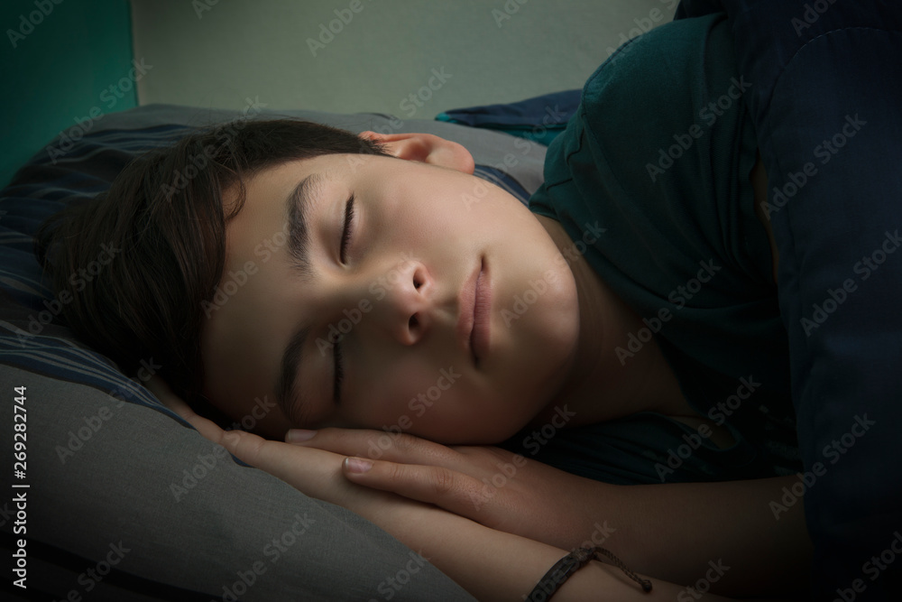 Boy sleeping in bed Boy sleeping in bed