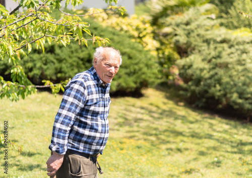 Portrait of Senior man in the garden.