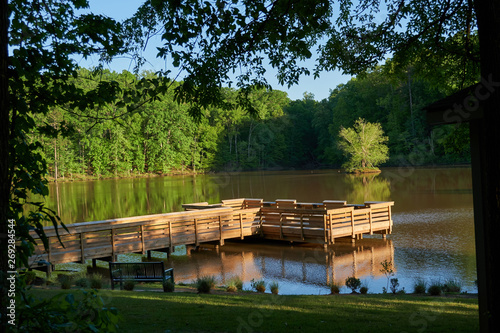   FORT MILL, SOUTH CAROLINA/UNITED STATES – APRIL 27, 2019: Fishing dock on the lake at Anne Springs Close Greenway in Fort Mill, South Carolina.      photo