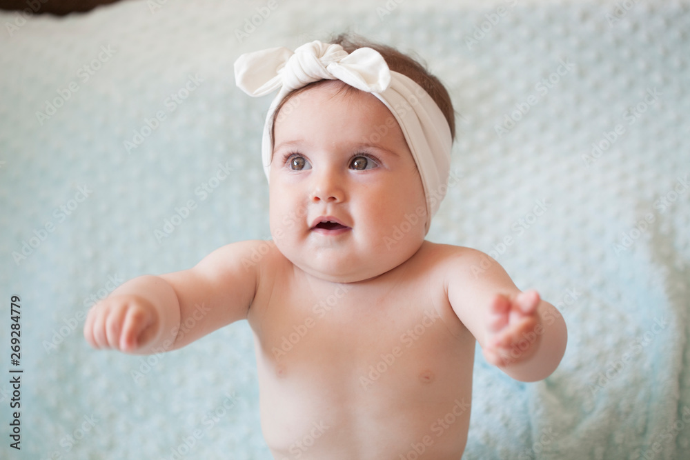 Portrait of 8 month old baby with bandanas Portrait of 8 month old baby with bandanas