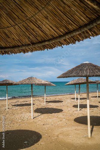 Fototapeta Naklejka Na Ścianę i Meble -  Sunshades on the Tsilivi Beach