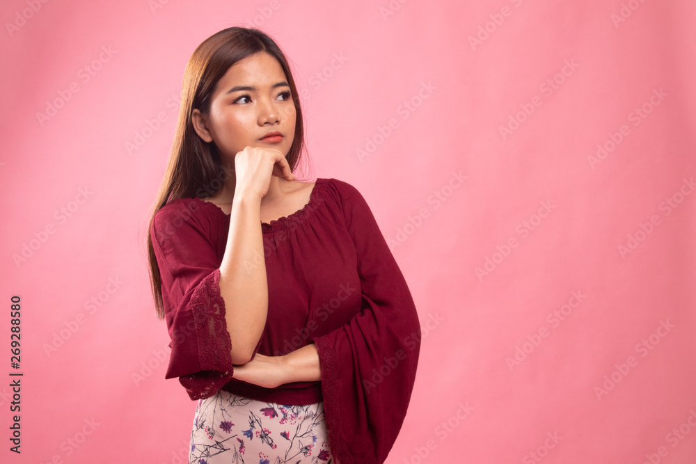 Serious young Asian woman look away. Serious young Asian woman look away.