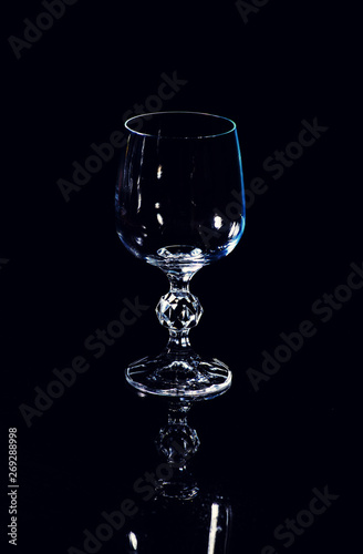 Empty wine glass. isolated on a black background