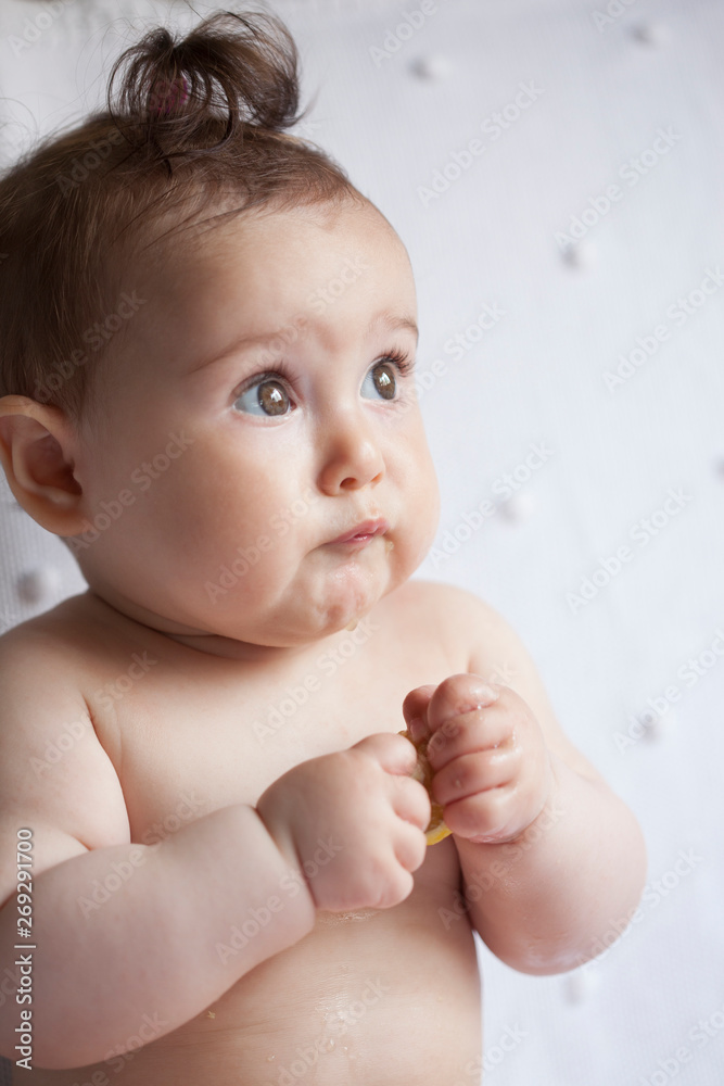 © bulentumut - portrait of baby eating lemon © bulentumut - portrait of baby eating lemon