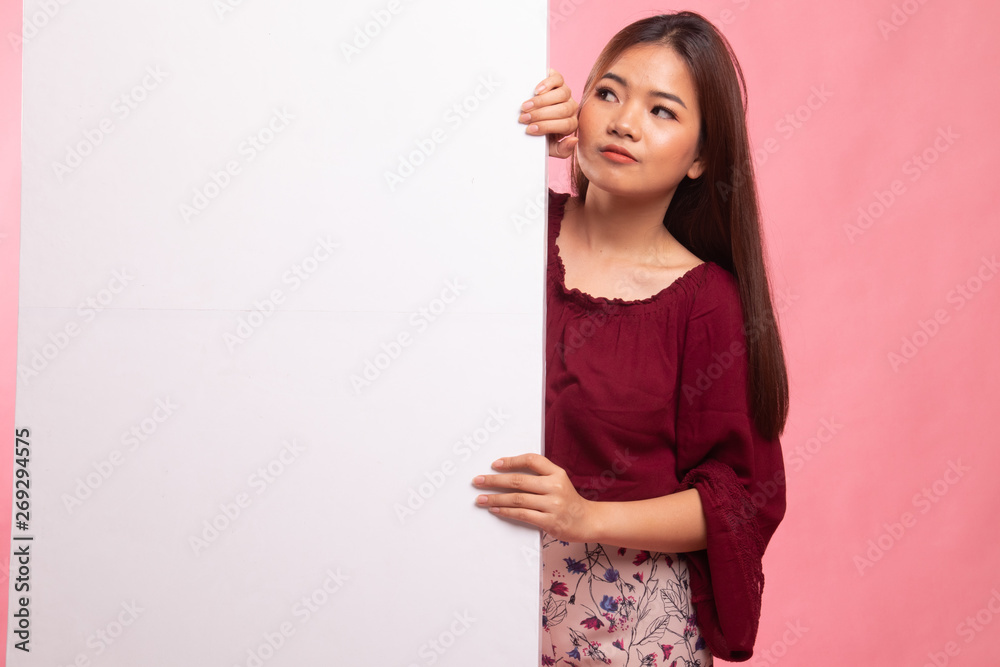 Young Asian woman with blank sign. Young Asian woman with blank sign.