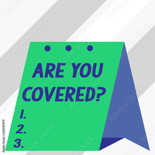 Writing note showing Are You Covered Question. Business concept for asking showing if they had insurance in work or life © Artur