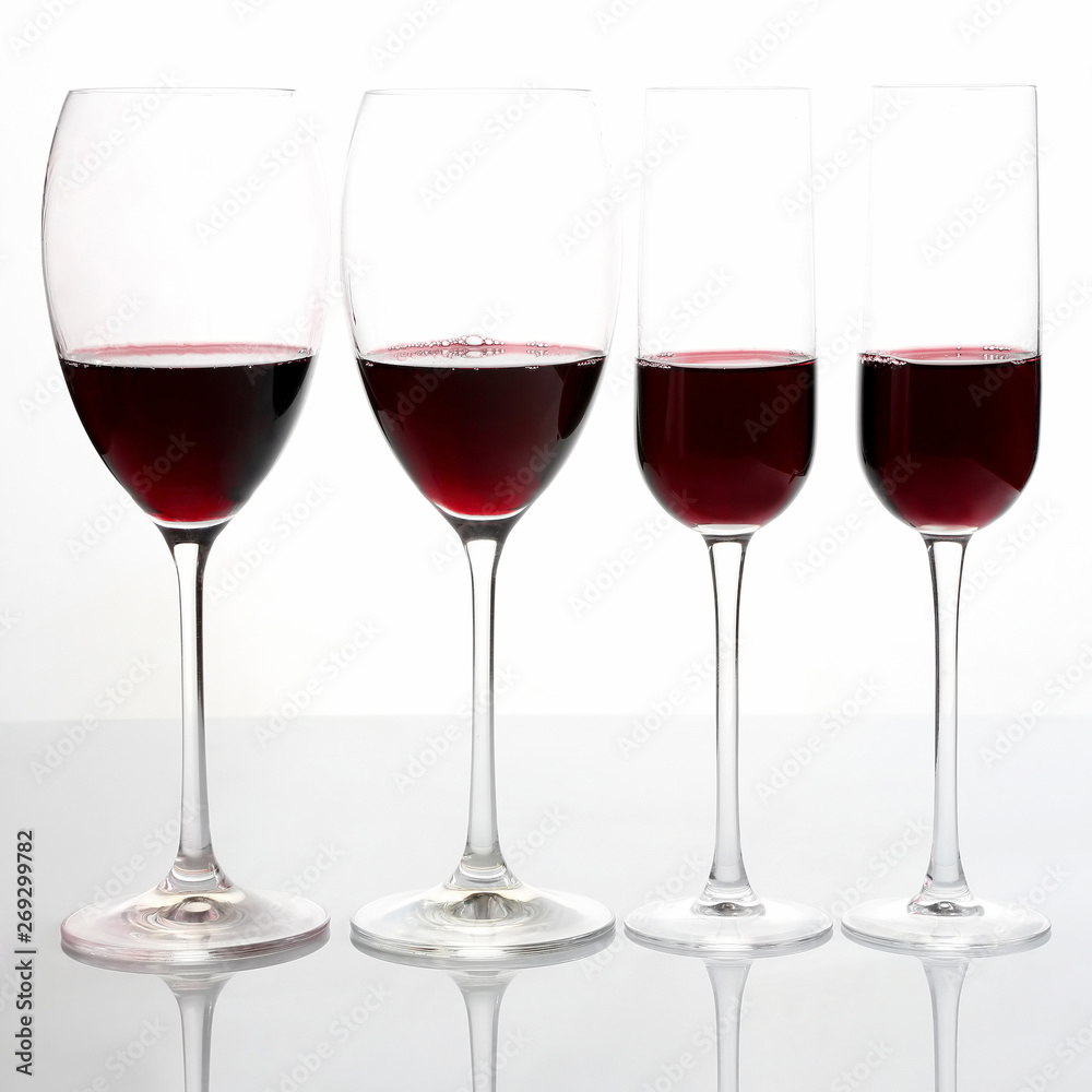 glasses with red wine on a light background glasses with red wine on a light background