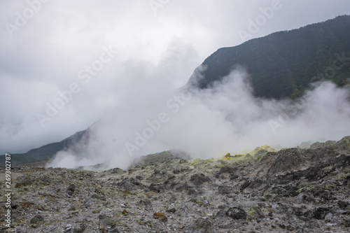 view of crater on active mountain with sulfur gas come out from stone. Beautiful landscape of mount Papandayan. Papandayan Mountain is one of the favorite place to hike on Garut.