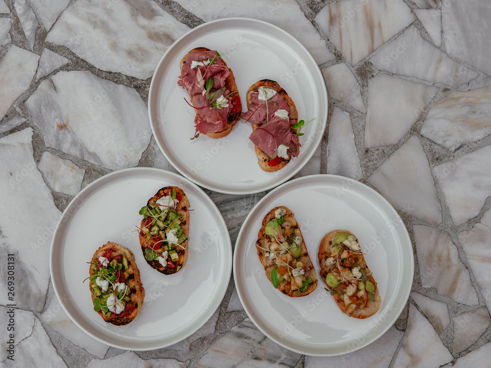 Delicious bruschetta with a variety of fillings. Delicious bruschetta with a variety of fillings.