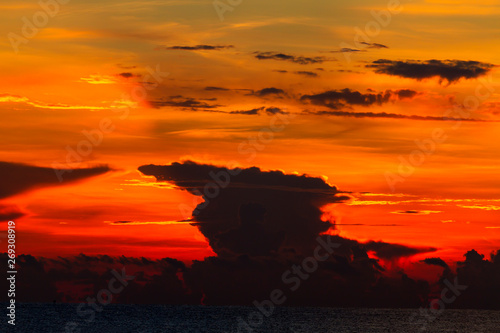 Sunrise and black  cloud at beach Ban Krut Beach photo