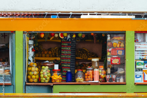 Juice and variety stand in the market of Puno seen from the front
