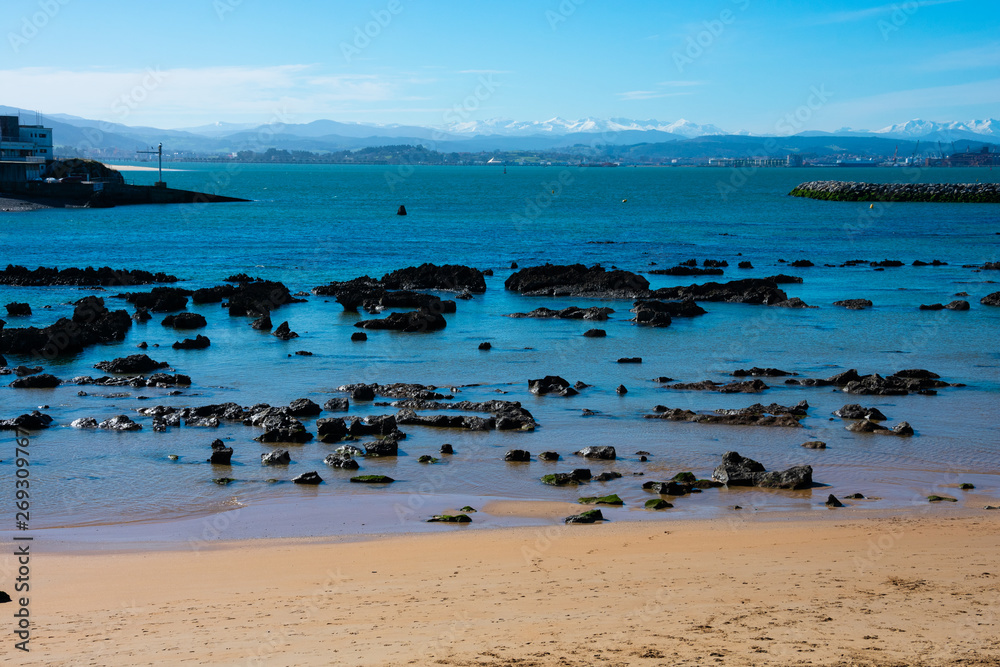 View of a rocky beach in the Magdalena Peninsula. Cantabrian Sea (Mar Cantabrico). Santander, Spain