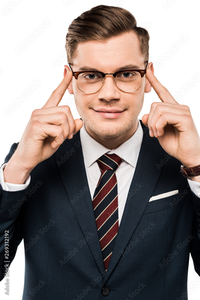 smiling businessman pointing with fingers at glasses isolated on white