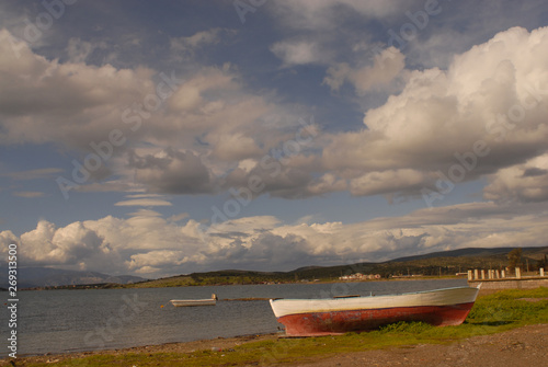 old fishing boat on the lake