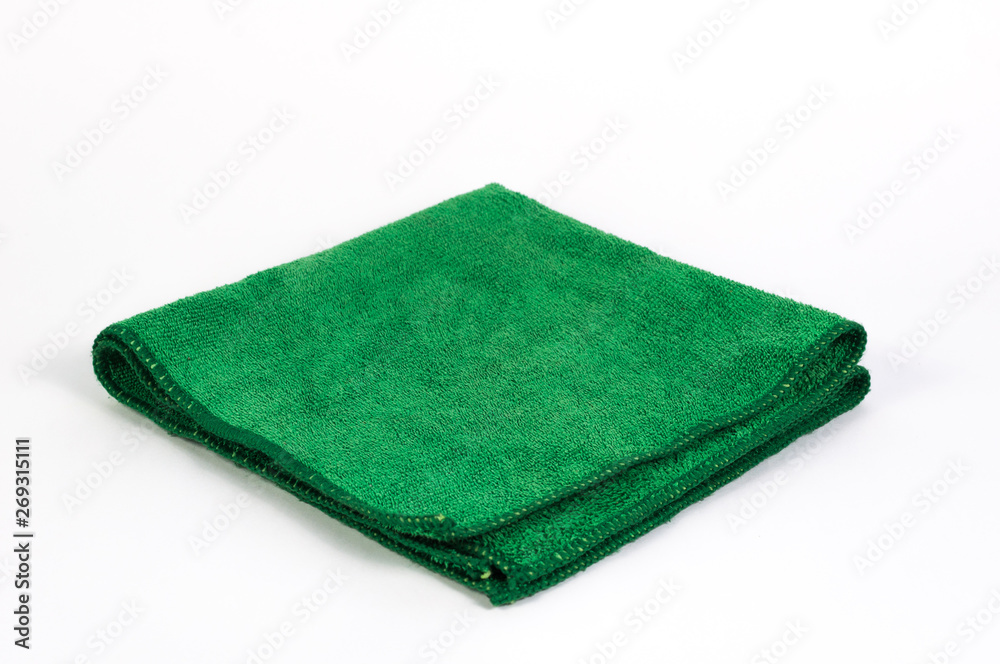 Close up Green Microfiber towel fold isolated on white background