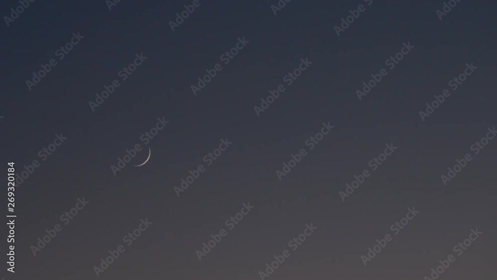 Crescent moon setting during the daytime Crescent moon setting during the daytime