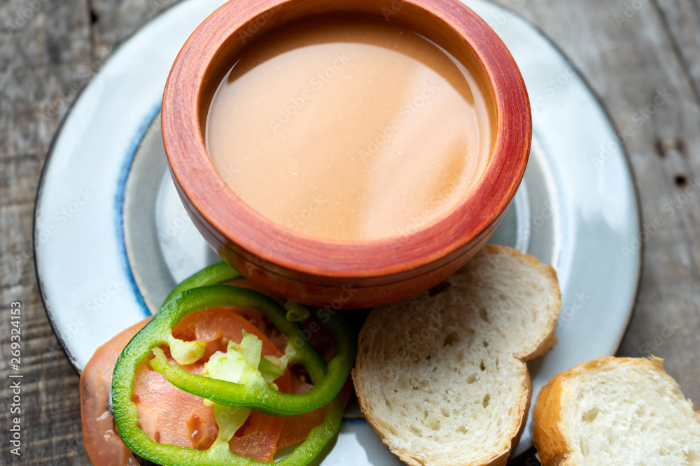 Spanish tomato gazpacho soup with garlic, bread and green pepper Spanish tomato gazpacho soup with garlic, bread and green pepper
