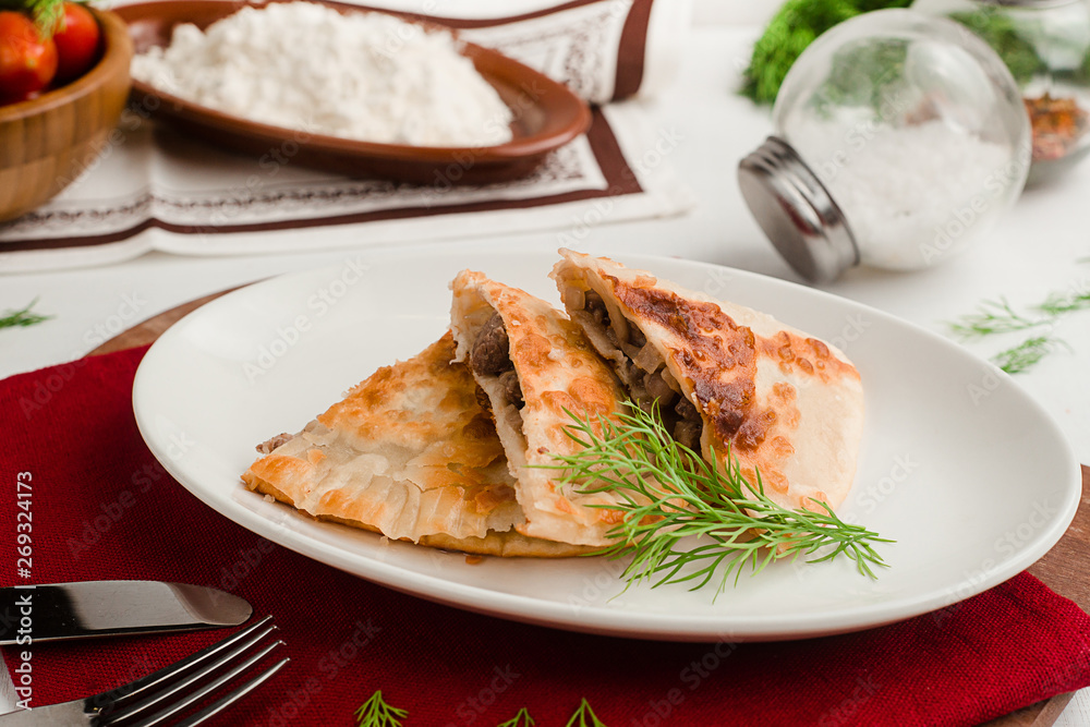 Traditional Caucasian cheburek with meat and dill. Menu for cafe in warm colors. Traditional Caucasian cheburek with meat and dill. Menu for cafe in warm colors.