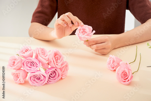 People making paper craft flower art