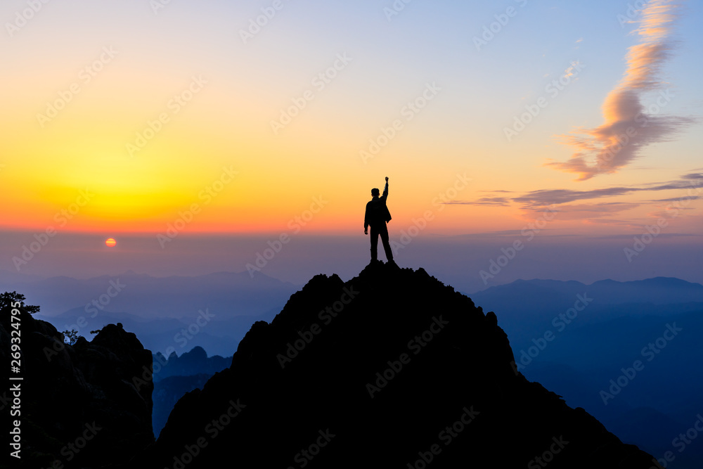 Happy man gesture of triumph with hands in the air,conceptual scene