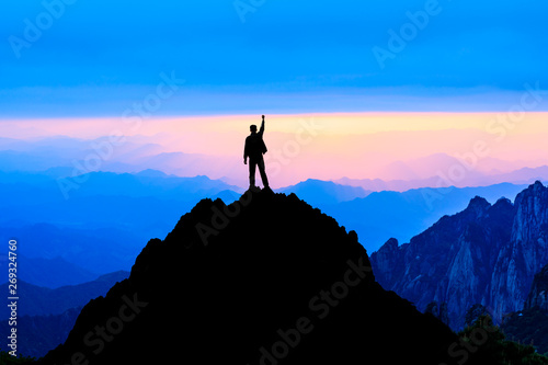 Happy man gesture of triumph with hands in the air,conceptual scene © ABCDstock