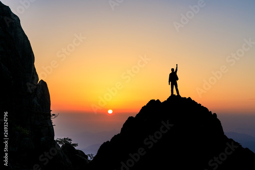 Happy man gesture of triumph with hands in the air,conceptual scene © ABCDstock