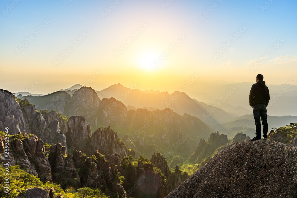 Man on top of mountain,conceptual scene