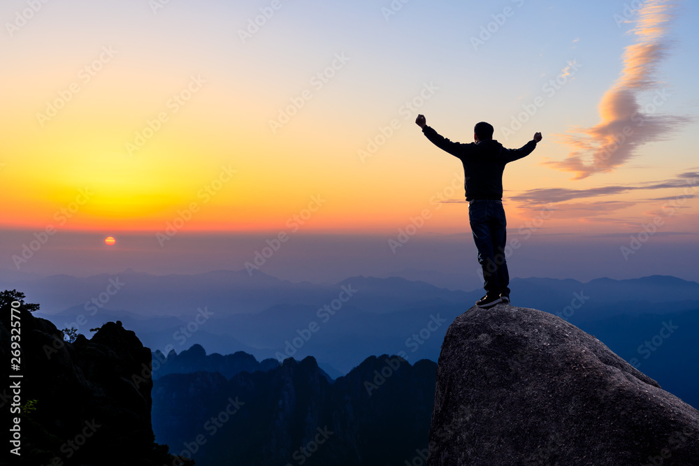 Happy man gesture of triumph with hands in the air,conceptual scene