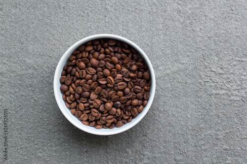 Ethiopian coffee beans isolated on grey background.