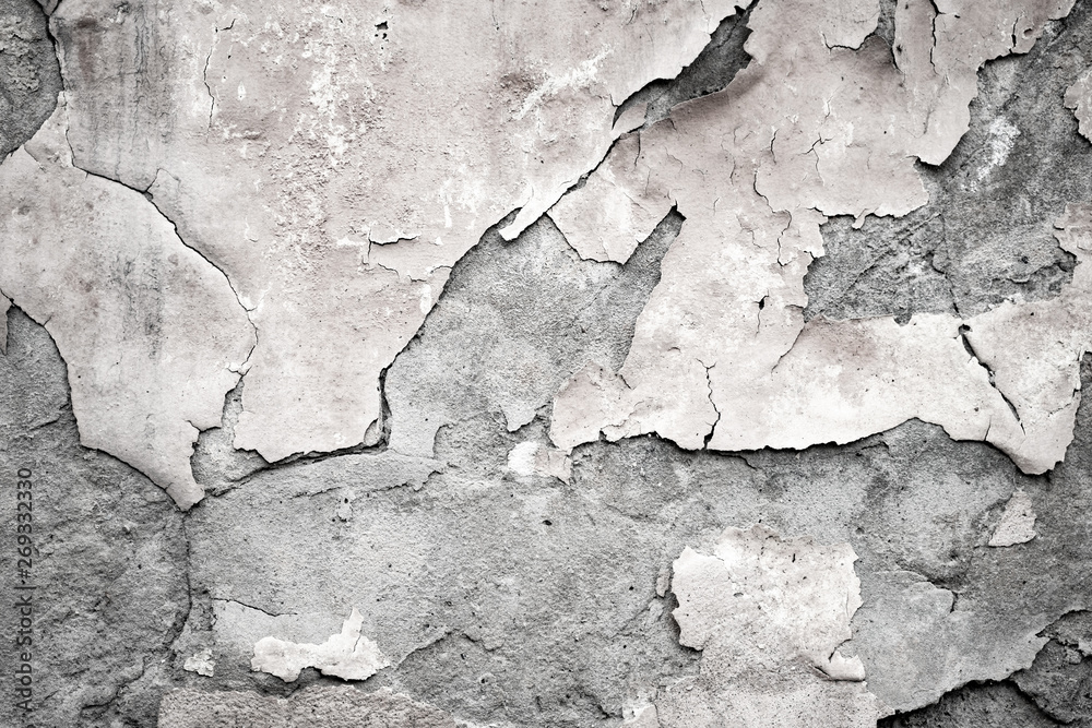 Obraz premium Fragment of the old wall with decaying and fallen off plaster