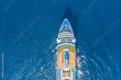 Nose of the cruise ship in the turquoise sea. Concept of summer sea cruise tours. © aapsky