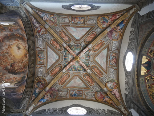 Parma Cathedral. Interior of Parma Cathedral has a Latin Cross plant and an underlying crypt. Naves, chapels and apse houses scuplture of Antelami and frescos of Correggio. The crypt houses the monume photo