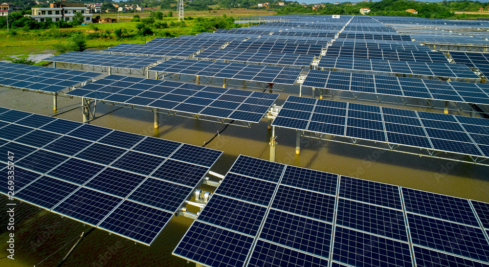 Aerial photography of solar photovoltaic panels built on the surface of the water Aerial photography of solar photovoltaic panels built on the surface of the water