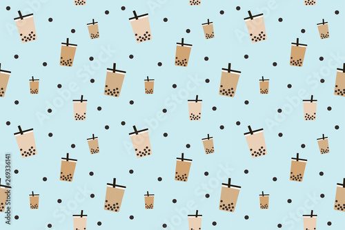 Seamless Boba tea on blue background, bubble tea, milk tea with black pearl, is a Taiwanese tea-based drink with chewy tapioca ball which also known as pearls, or bobals. It's very popular in Asia. photo