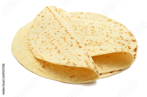 tortilla round flat bread isolated on white photo