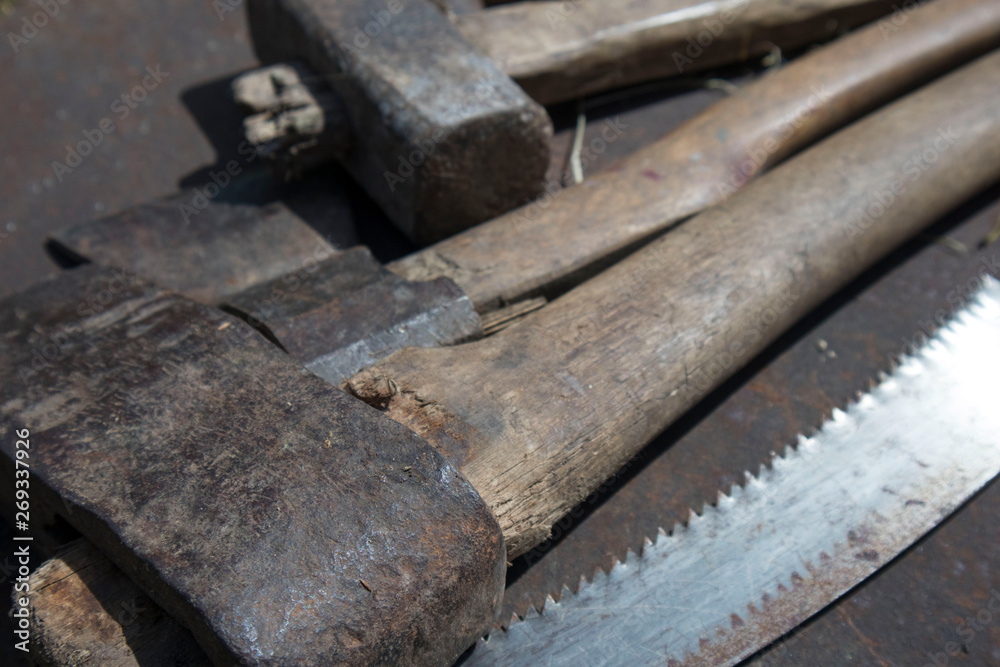 building kit, saw, hammer, axe, concept of construction, repair, installation. building kit, saw, hammer, axe, concept of construction, repair, installation.