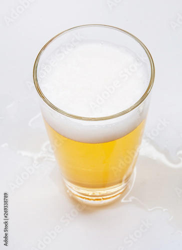 Glass of beer isolated on white